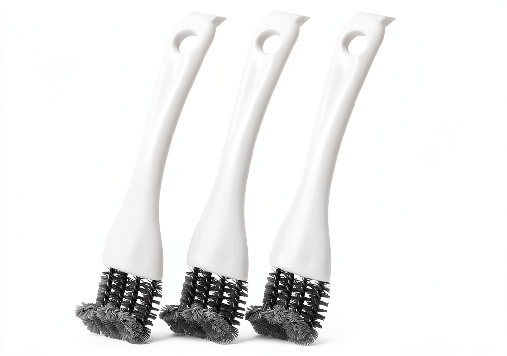 Sinbana bird cage brush set being used on a metal cage