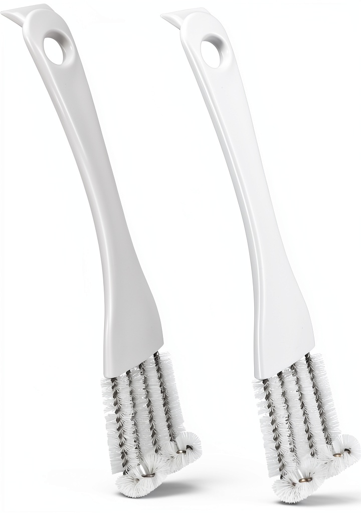 Ptwola bird cage brush being used inside a cage